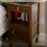 F21. Pair of marble top nightstands. 